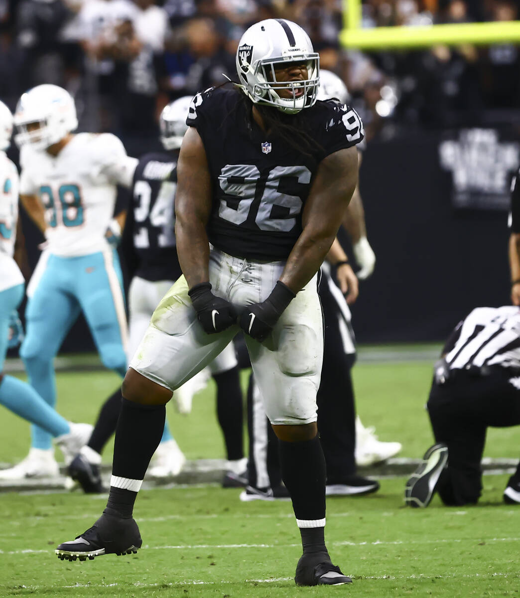 Raiders defensive tackle Darius Philon celebrates after a play against the Miami Dolphins durin ...
