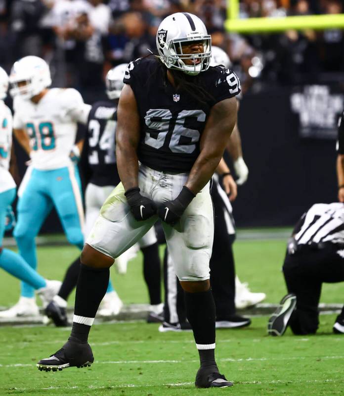 Raiders defensive tackle Darius Philon celebrates after a play against the Miami Dolphins durin ...