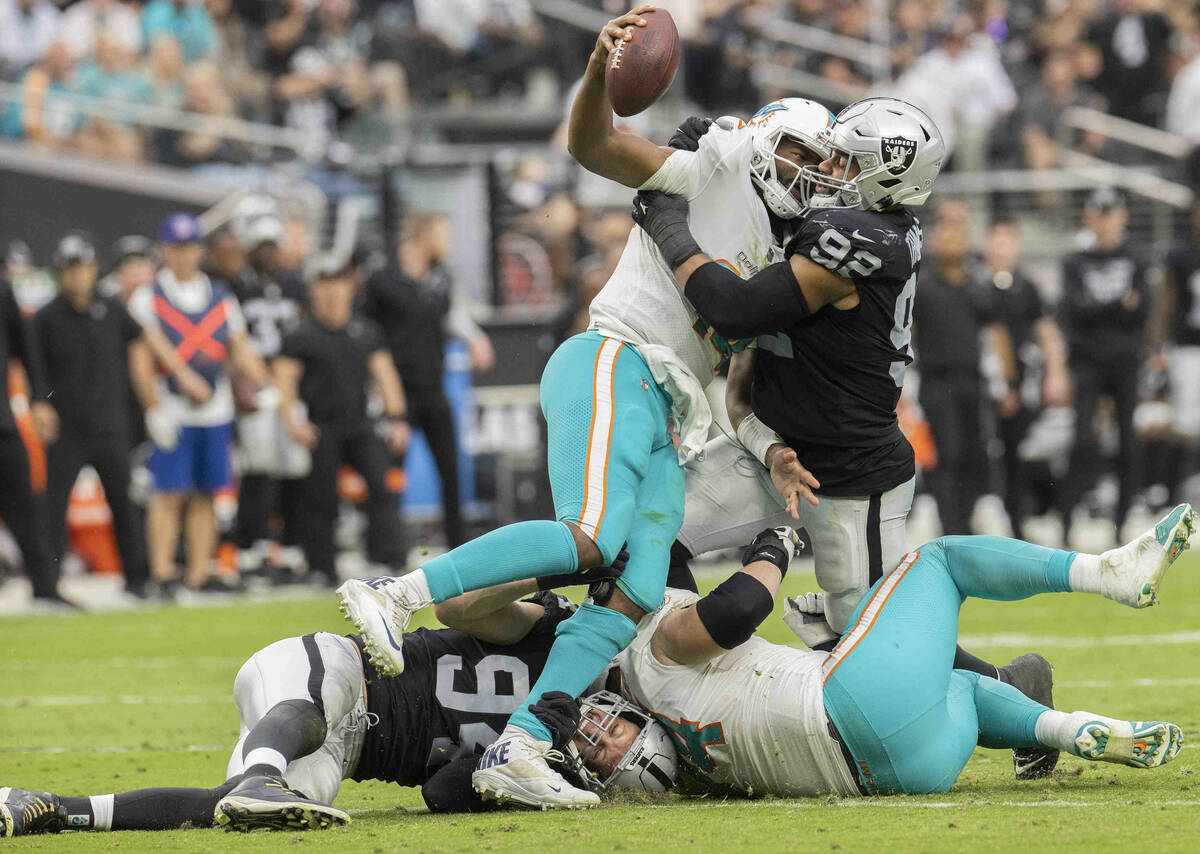 Las Vegas Raiders defensive end Carl Nassib (94) and Las Vegas Raiders defensive end Solomon Th ...