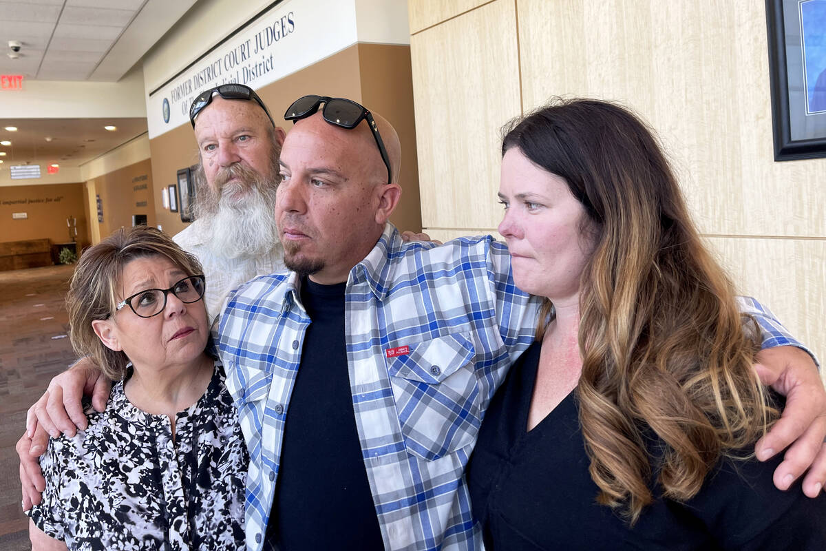 Dennis Selby, center, with (from left) mother Stephanie, father Gary, and wife Jodie, outside a ...