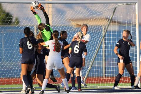 Centennial's Ava Johnson (0) catches the ball in a corner kick during the first half of a girl' ...
