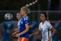 Bishop Gorman's Michelie Madrid (11) controls the ball as Palo Verde's Lauren Kinkead (14) duri ...