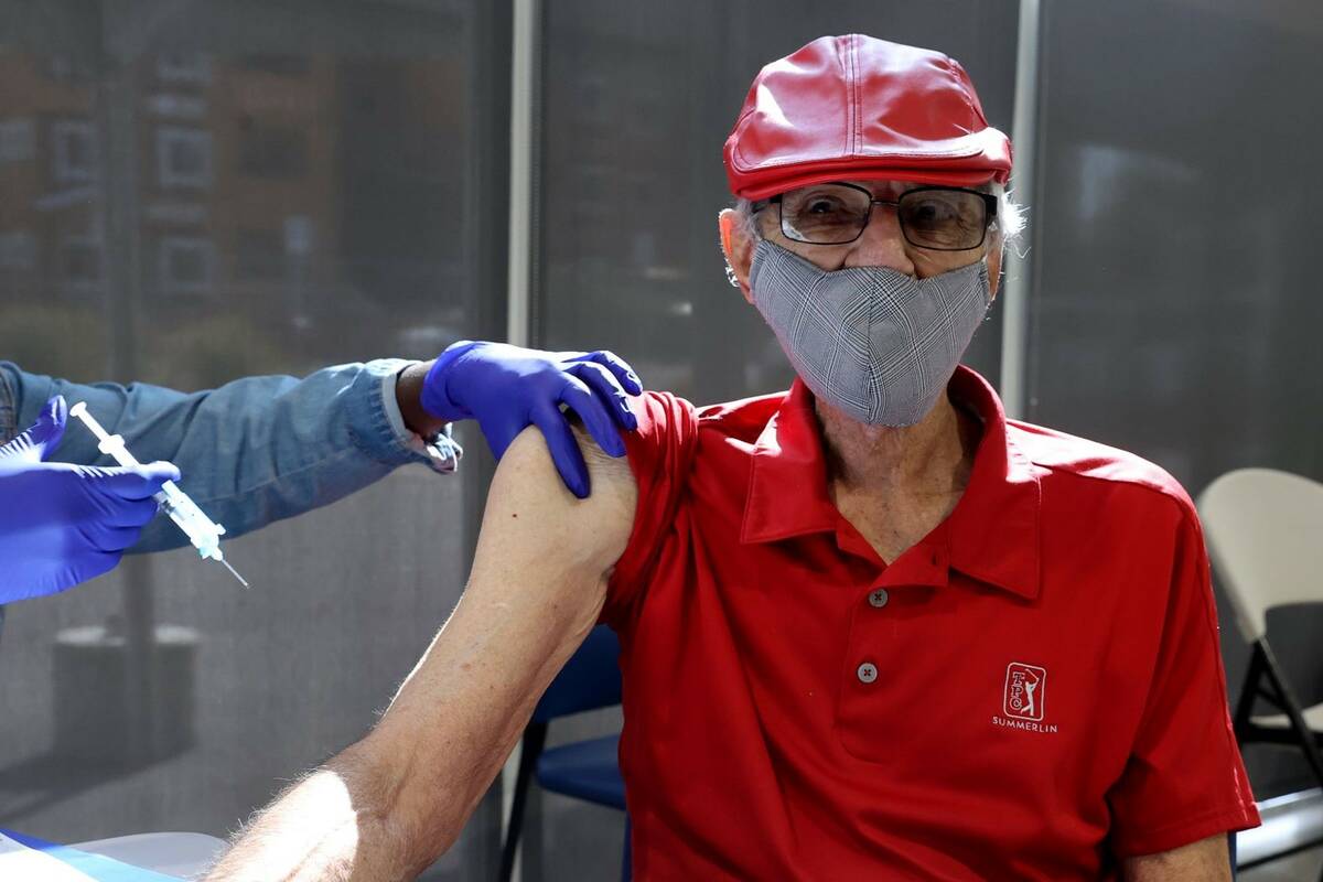 Charles "Buddy Charles" Wucinich, 84, of Las Vegas gets a Pfizer COVID-19 vaccine booster shot ...