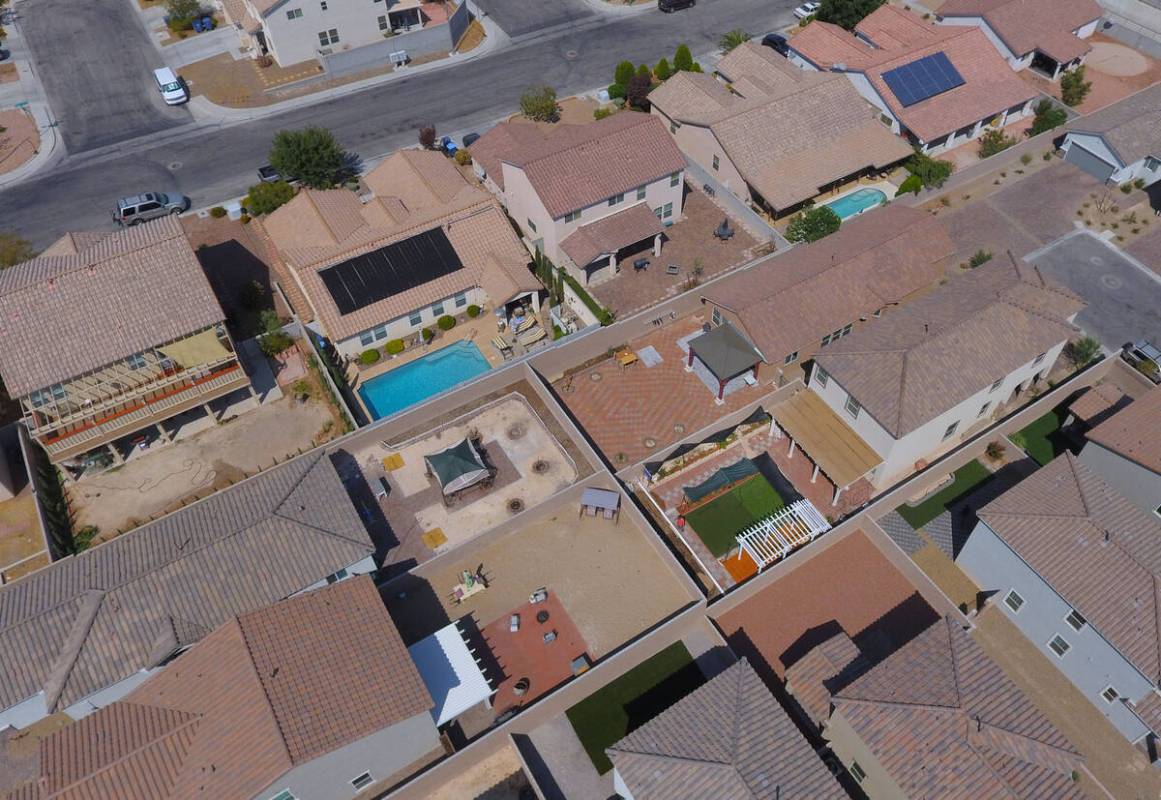 An aerial photo shows home on Dewey Drive and Autumn Cliff Way near Jones Boulevard on Tuesday, ...