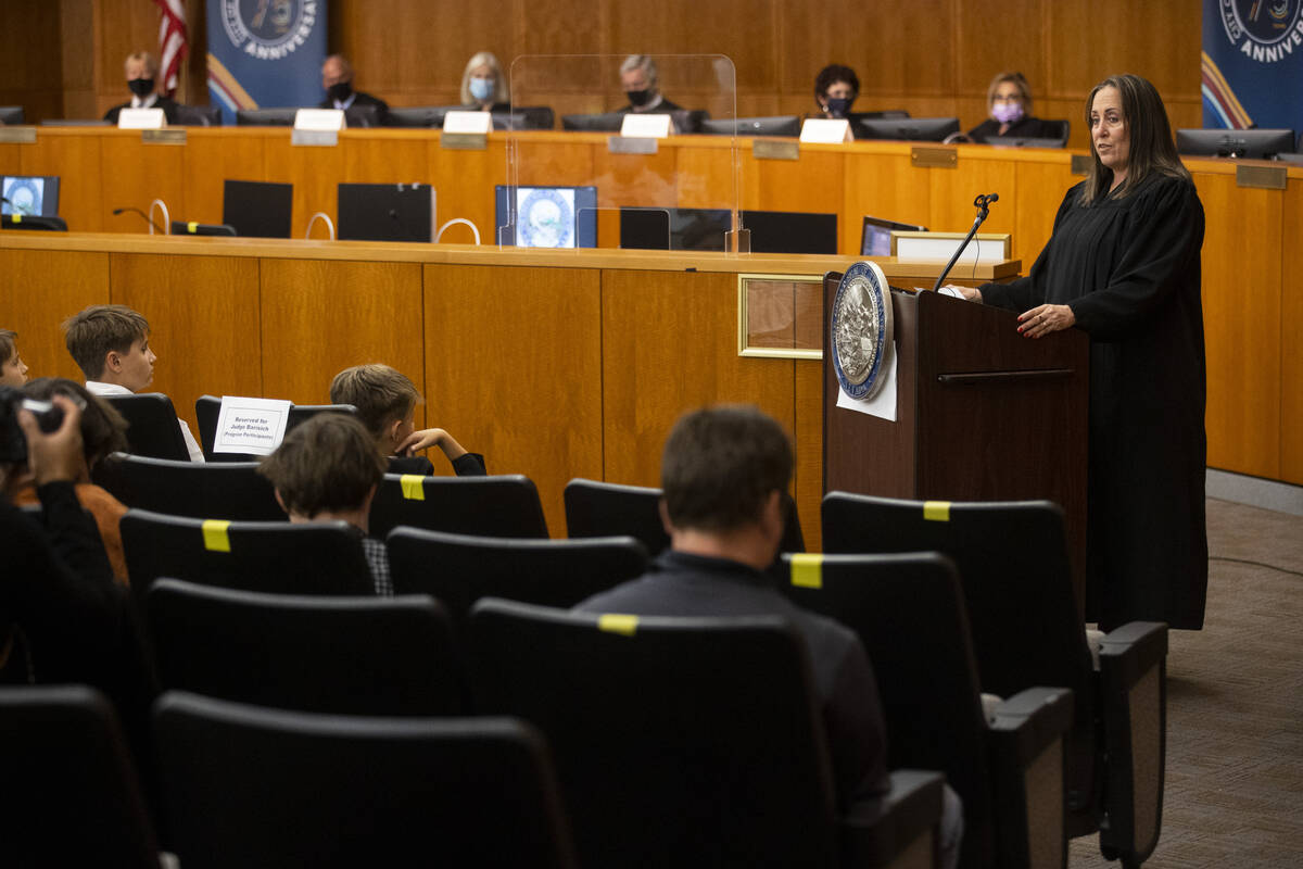 Judge Jessica Peterson gives a speech after being sworn in during the Eight Judicial District C ...