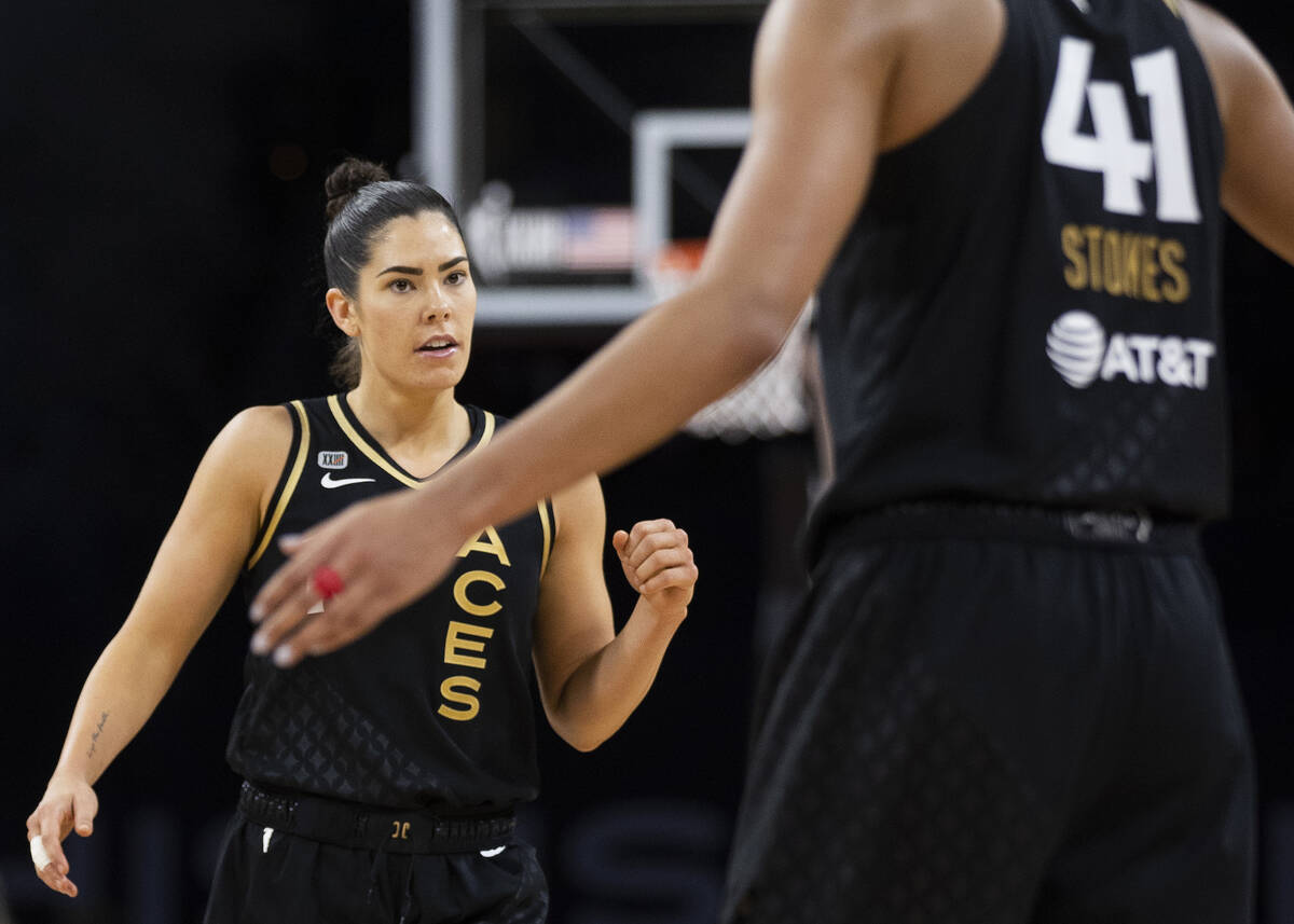 Las Vegas Aces guard Kelsey Plum (10) celebrates a big play with teammates in the second half o ...