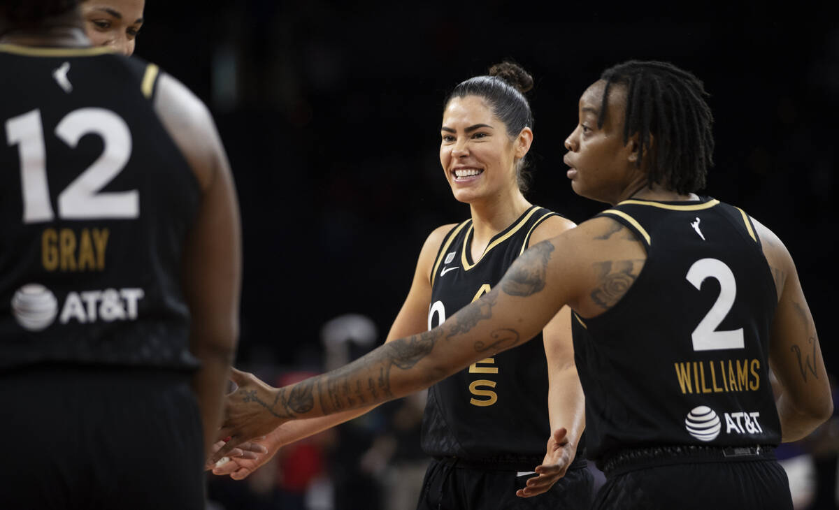 Las Vegas Aces guard Kelsey Plum (10) celebrates a big play with teammates in the second half o ...