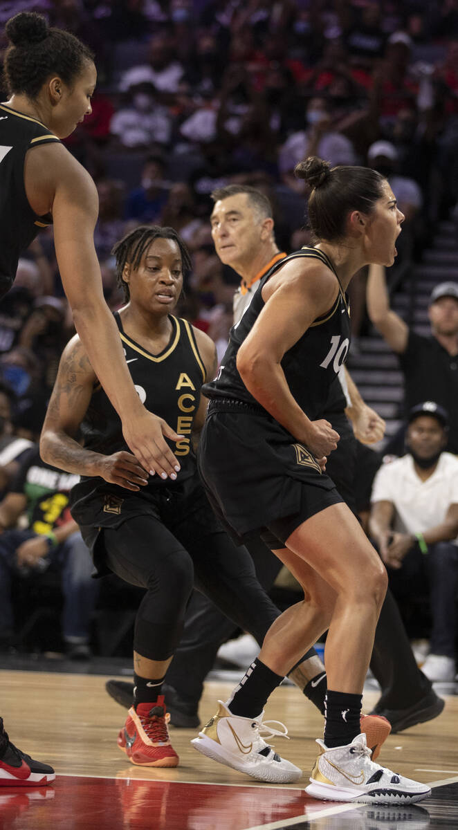 Las Vegas Aces guard Kelsey Plum (10) celebrates a big play with teammates in the second half o ...