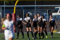 Faith Lutheran players celebrate after defeating Arbor View 2-1 during a girls high school socc ...