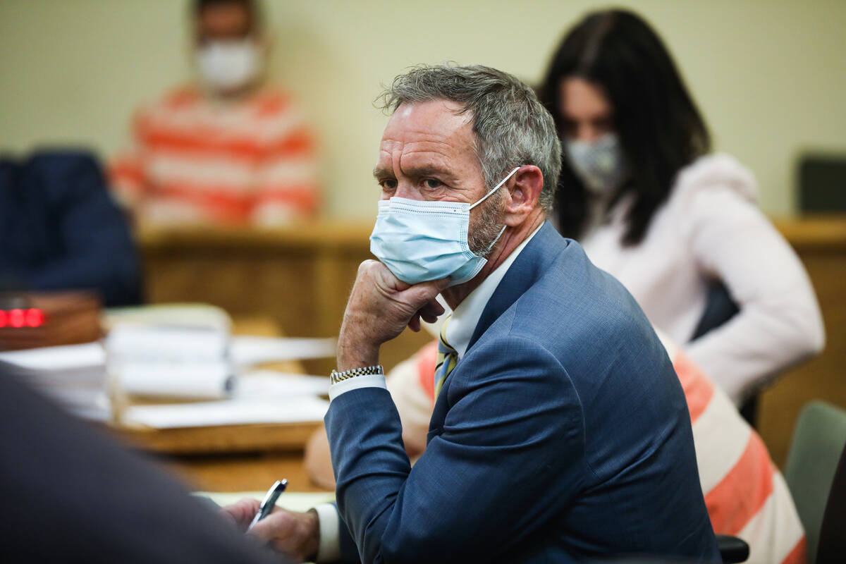 Attorney Thomas Gibson listens to the prosecutor speak at a preliminary hearing the alleged kil ...