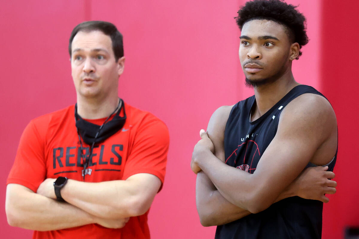 UNLV coach Kevin Kruger with guard Bryce Hamilton after practice at the Mendenhall Center in La ...