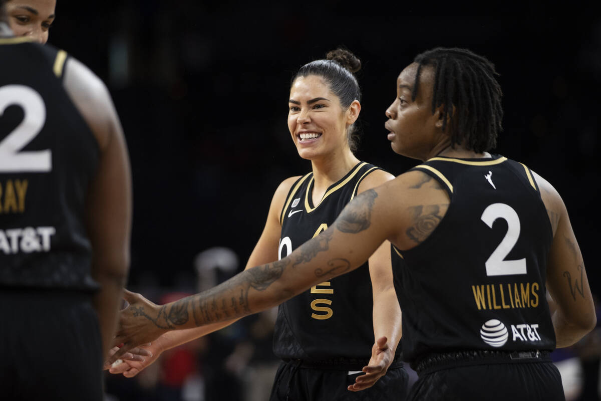 Las Vegas Aces guard Kelsey Plum (10) celebrates a big play with teammates in the second half o ...