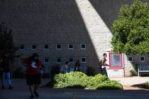 Students exit the Lied Library at UNLV in Las Vegas Thursday, Sept. 16, 2021. (Rachel Aston/Las ...
