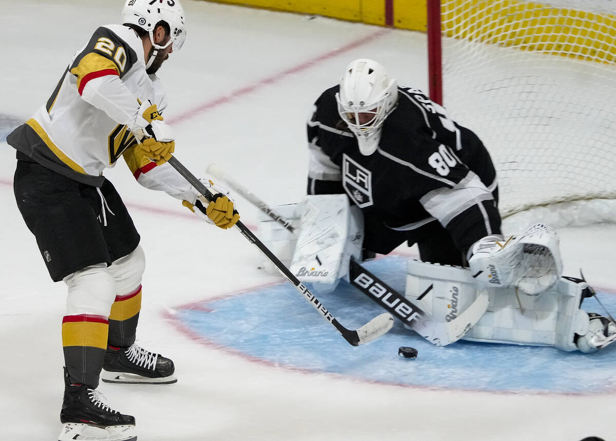 Los Angeles Kings goalie Garret Sparks (80) stops the shot of Vegas Golden Knights center Chand ...