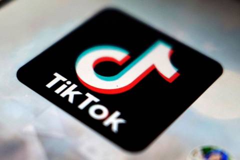 In this Monday, Sept. 28, 2020, filer, a logo of a smartphone app TikTok is seen on a user post ...