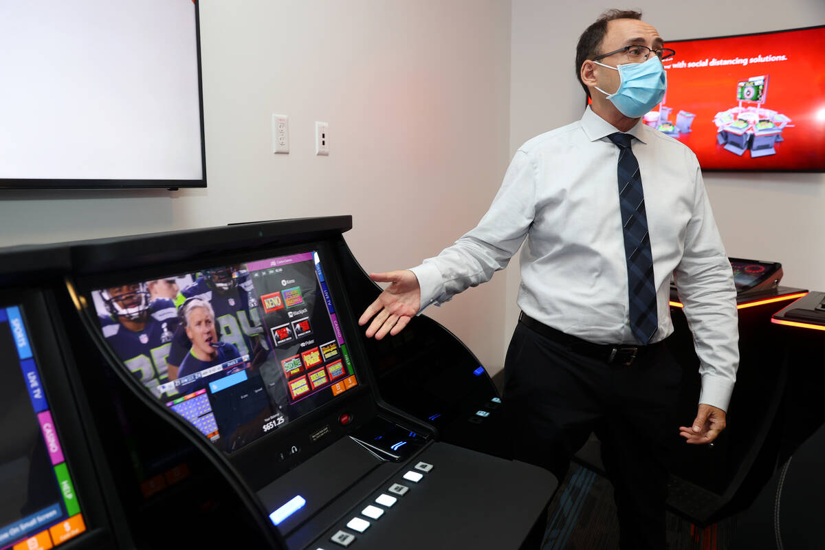 Chief Operating Officer of Gaming for IGT Nick Khin, gives a tour of new gaming technology at t ...