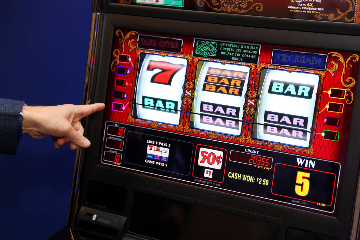 Sr. Director Core Product Roger Pettersson, gives a tour of new gaming technology at the IGT he ...