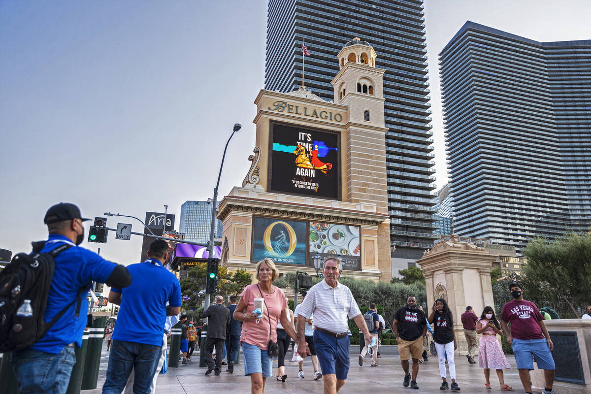 Pedestrians walk past Bellagio on Monday, September 27, 2021. Blackstone bought the Bellagio in ...