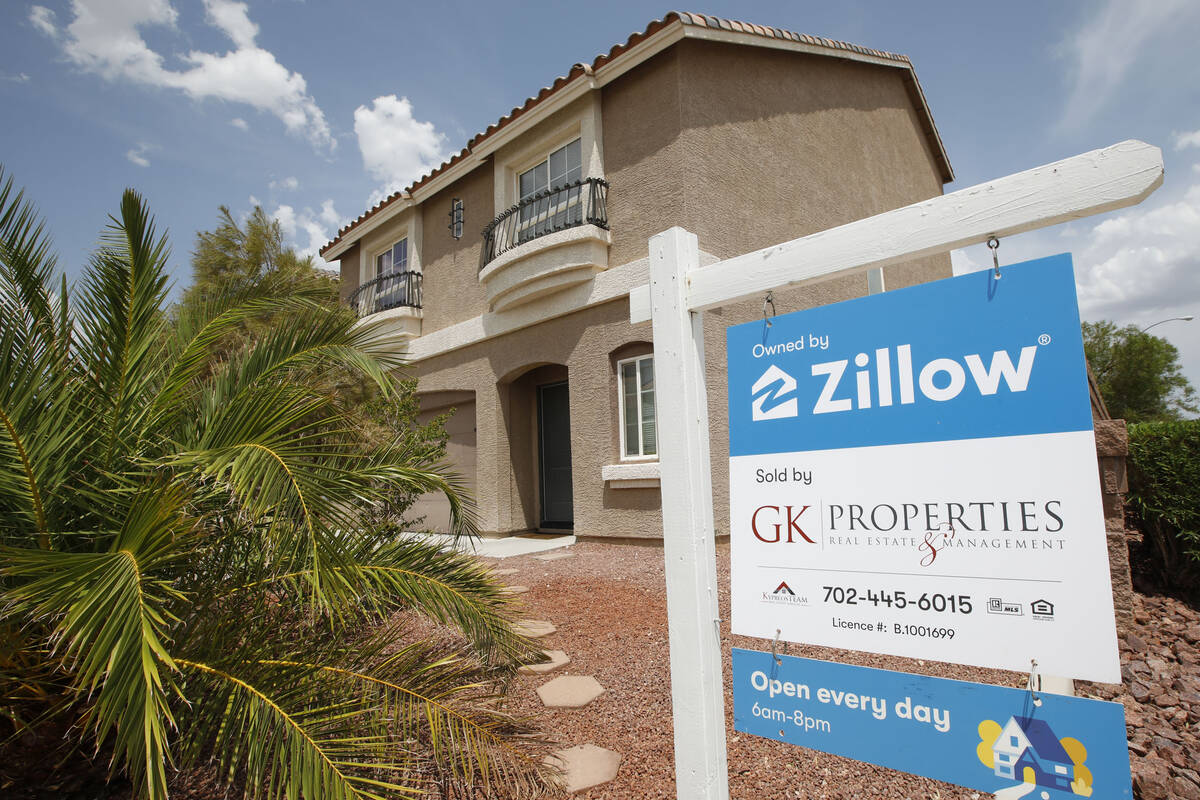 A sale sign is seen in front of a Zillow-owned house at 9992 Mills Reef Court in Las Vegas, Fri ...