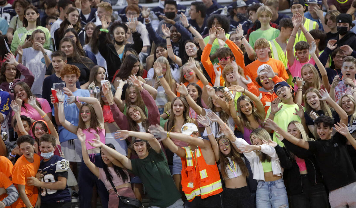 Foothill High School's fans cheer during the first half of a football game at Foothill High Sch ...