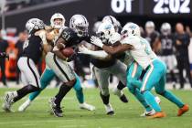 Las Vegas Raiders running back Peyton Barber (31) runs the ball in overtime in a NFL football g ...