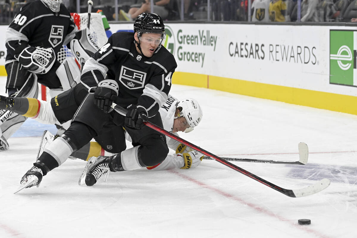 Los Angeles Kings defenseman Mikey Anderson (44) and Vegas Golden Knights center Nolan Patrick ...