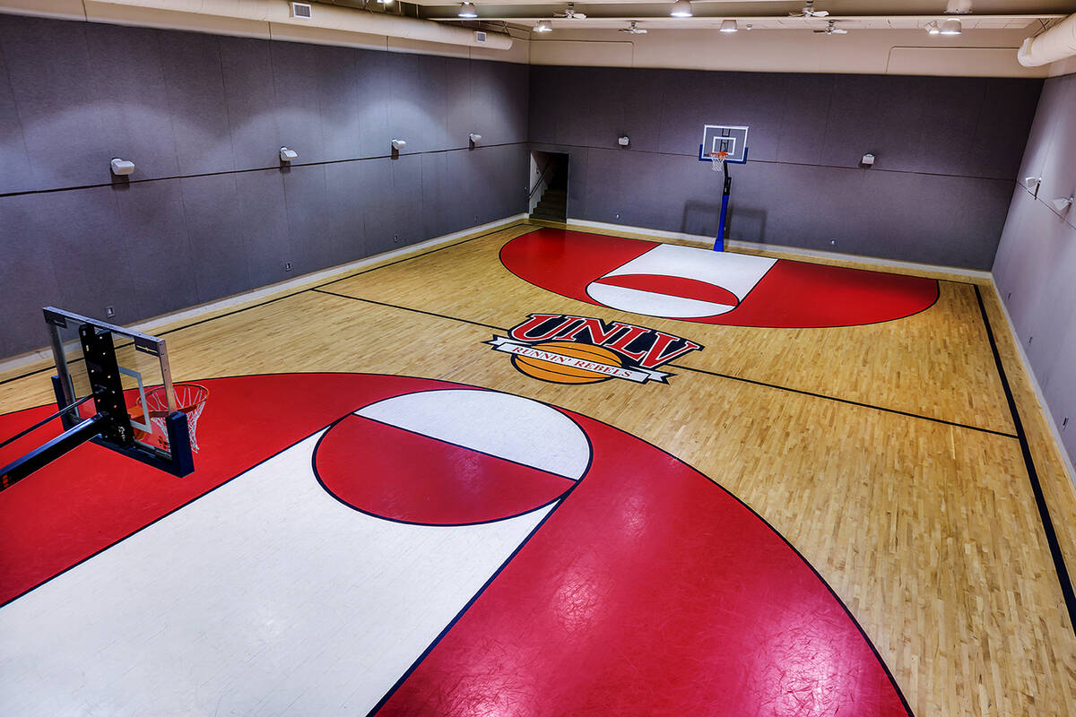 A mansion in Tournament Hills in Summerlin, 8912 Greensboro Lane, is listed for $13.9 million. ...