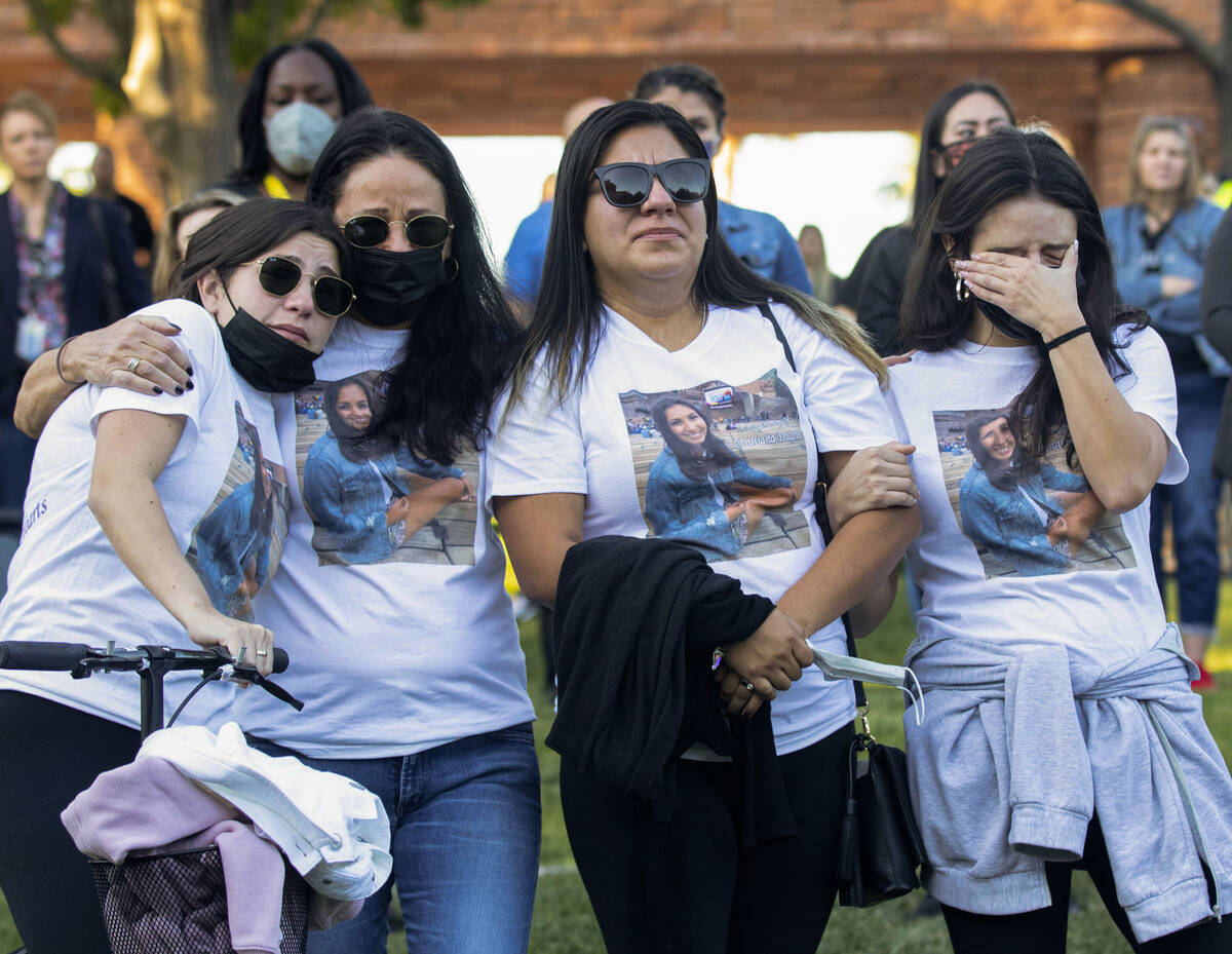 Sophia Ramirez, left, her mother Kaycee Meeks, and her sister Olivia Ramirez, right, attend the ...