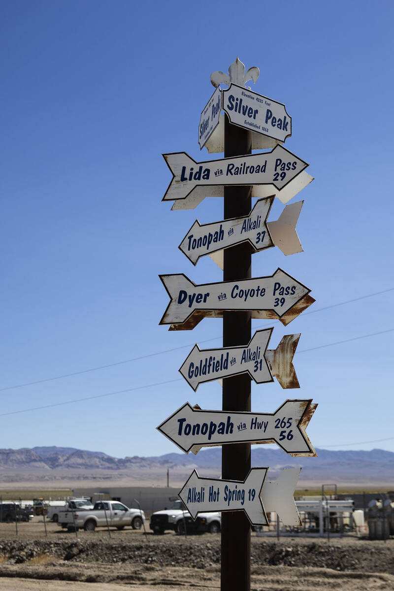 Signs of the nearby cities and towns are posted near Albemarle's lithium mine in Silver Peak, N ...