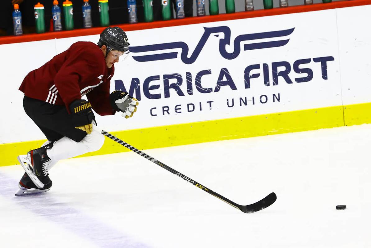 Golden Knights' Evgenii Dadonov skates with the puck during the first on-ice day of training ca ...