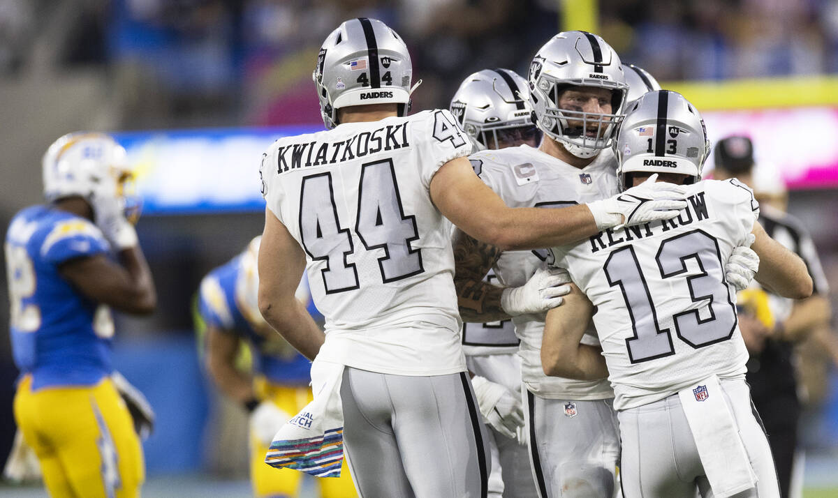 Raiders wide receiver Hunter Renfrow (13) celebrates with teammates after making a big special ...