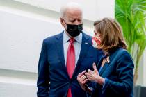 President Joe Biden and House Speaker Nancy Pelosi of Calif., speak together as they depart aft ...