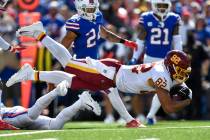 Washington Football Team tight end Logan Thomas (82) dives for yardage during the first half of ...