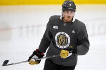 Golden Knights defenseman Zach Whitecloud (2) eyes the puck during a NHL hockey training camp p ...
