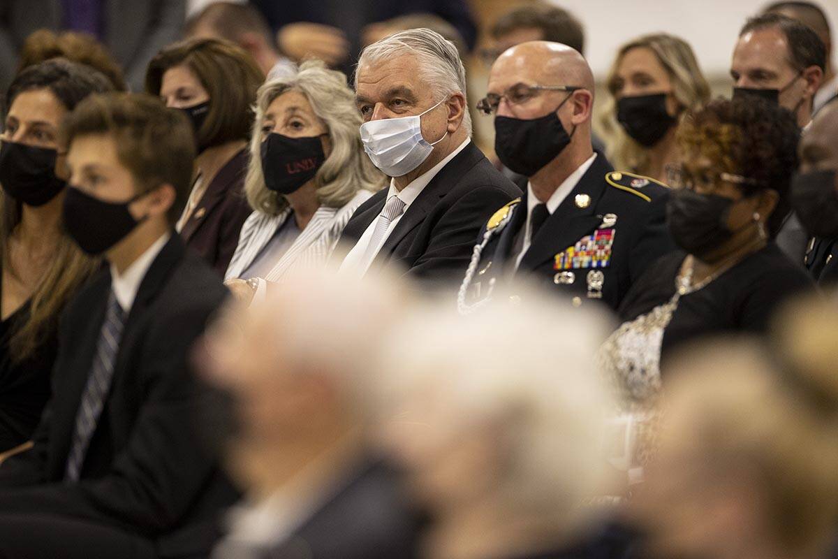 Gov. Steve Sisolak, center, Rep. Dina Titus, left, attend a ceremony to honor the memory of Nev ...