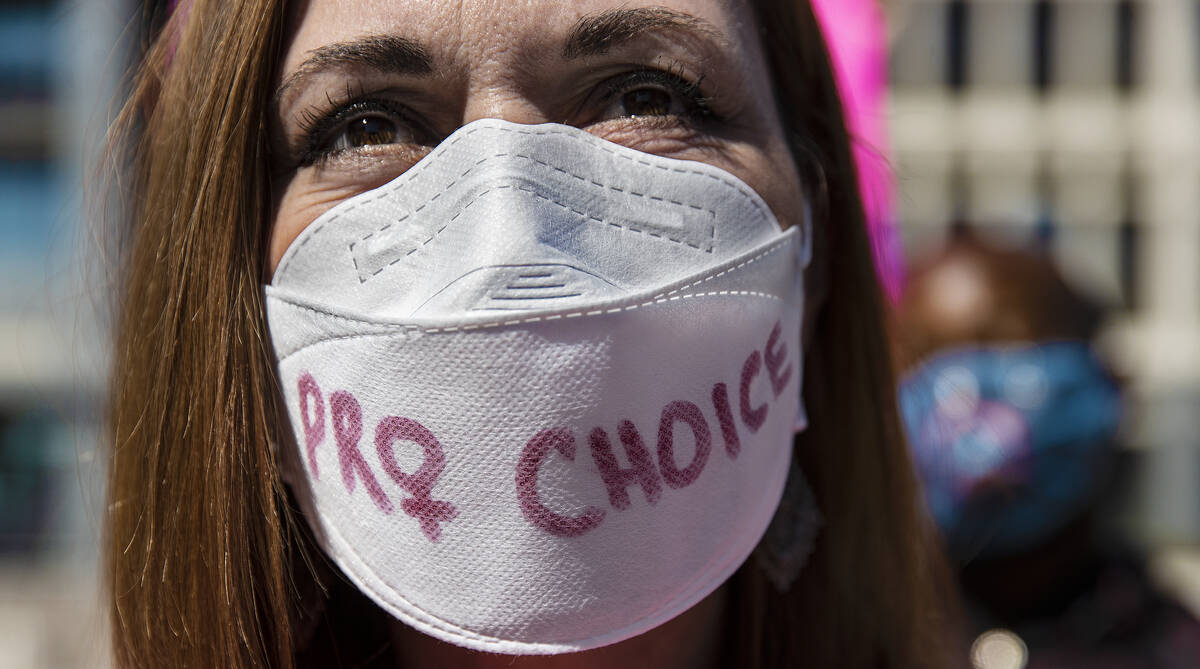 Amy Vilela demonstrates outside the Lloyd D George Courthouse during a March for Reproductive R ...