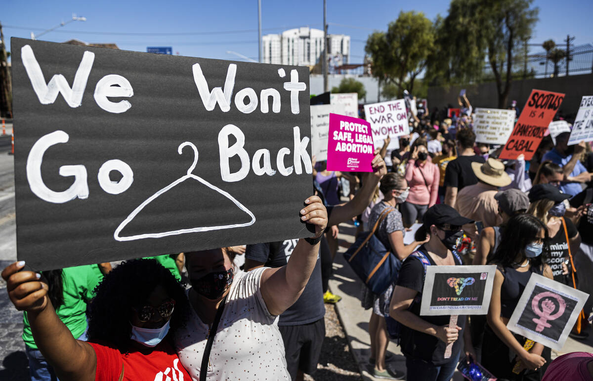 Demonstrators gather outside the Lloyd D George Courthouse during a March for Reproductive Righ ...