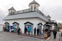 People line up to buy Powerball and Mega Millions lottery tickets at the Primm Valley Lotto Sto ...