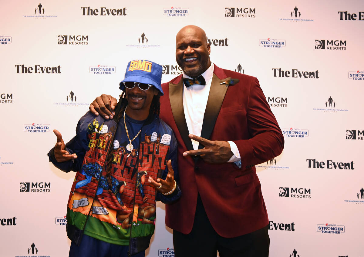 Snoop Dogg, left, and Shaquille O'Neal are shown at "The Event," a benefit concert for the Shaq ...