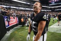 Raiders fullback Alec Ingold celebrates with fans after an overtime win against the Baltimore R ...
