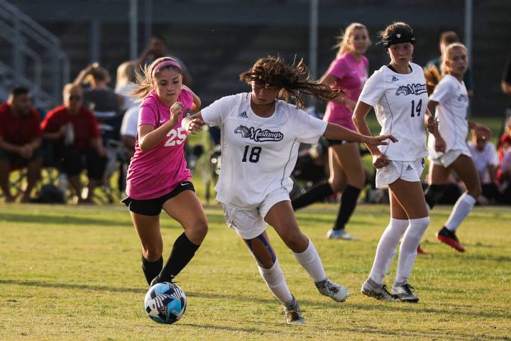 Desert OasisՠMia Brown (25) tries to steal the ball from Shadow Ridgeճ Leighanne Ki ...