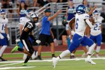 Green Valley High School's Jaylen McKnight (6) runs into the end zone for a touchdown during th ...