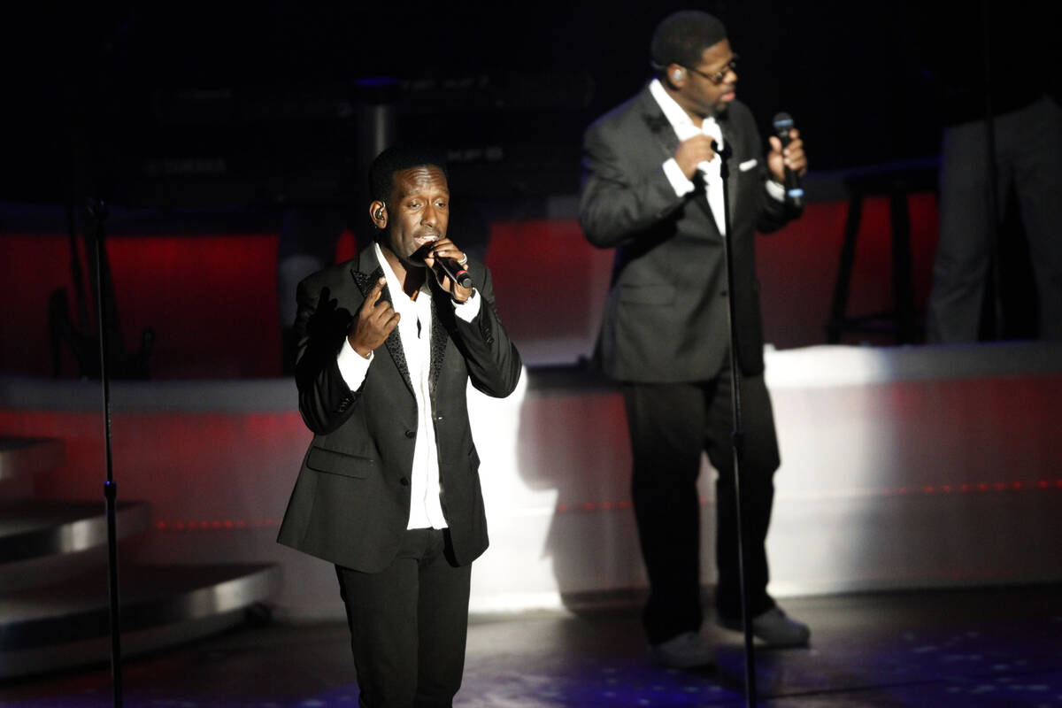 Singer Shawn Stockman, left, of Boyz II Men performs during a show at the Terry Fator Theatre i ...