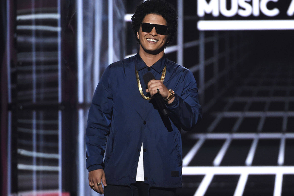 FILE - In this May 20, 2018, file photo, Bruno Mars presents the Icon award at the Billboard Mu ...