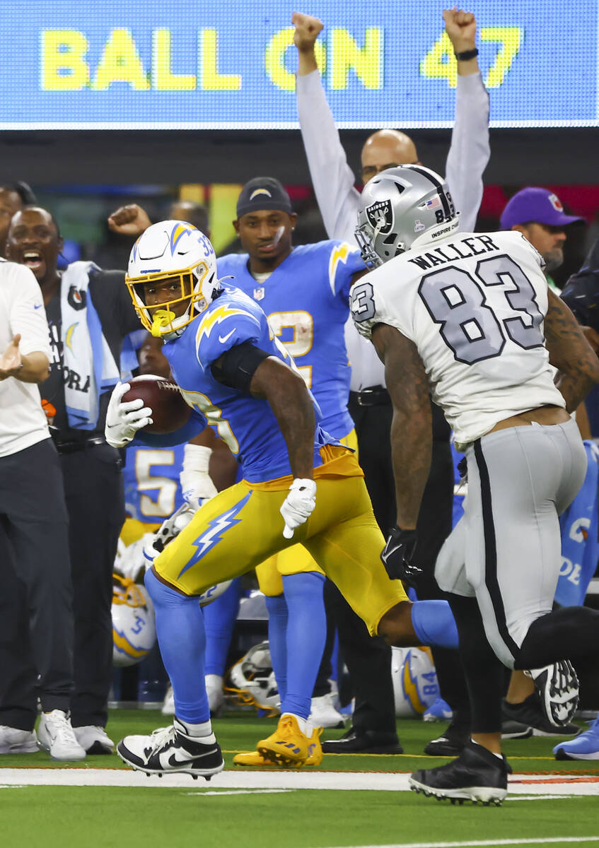 Los Angeles Chargers free safety Derwin James (33) runs the ball after intercepting a pass inte ...