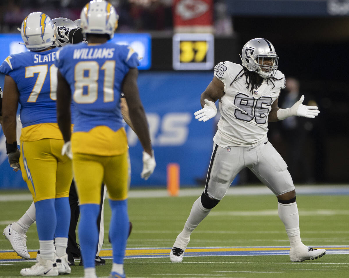 Raiders defensive tackle Darius Philon (96) celebrates after sacking Los Angeles Chargers quart ...