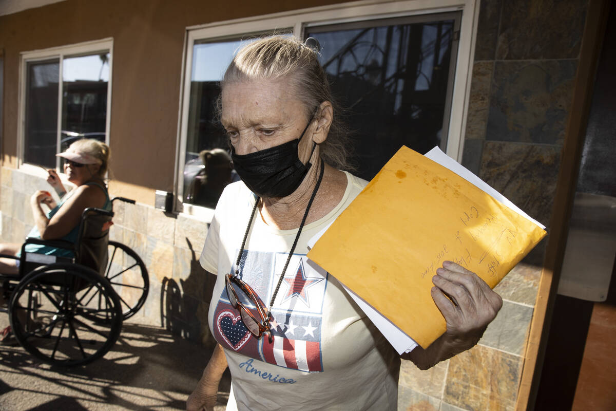 Share Village resident Cecelia Knapp walks to her apartment in Las Vegas, Friday, Oct. 1, 2021. ...