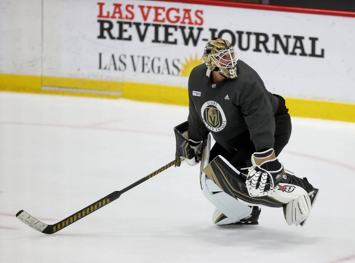 Vegas Golden Knights goaltender Robin Lehner rushes back to the net on a live play during pract ...