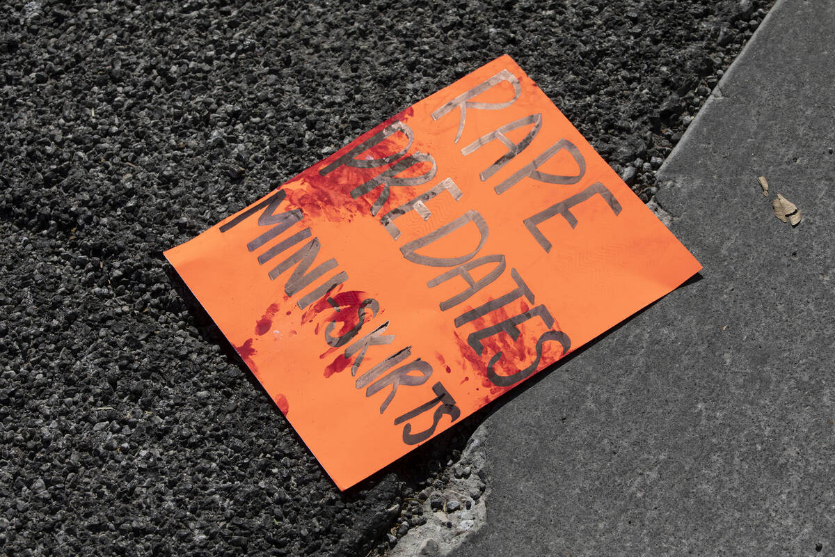 A sign is on the road as Coronado High School students protest outside the school on Friday, Oc ...