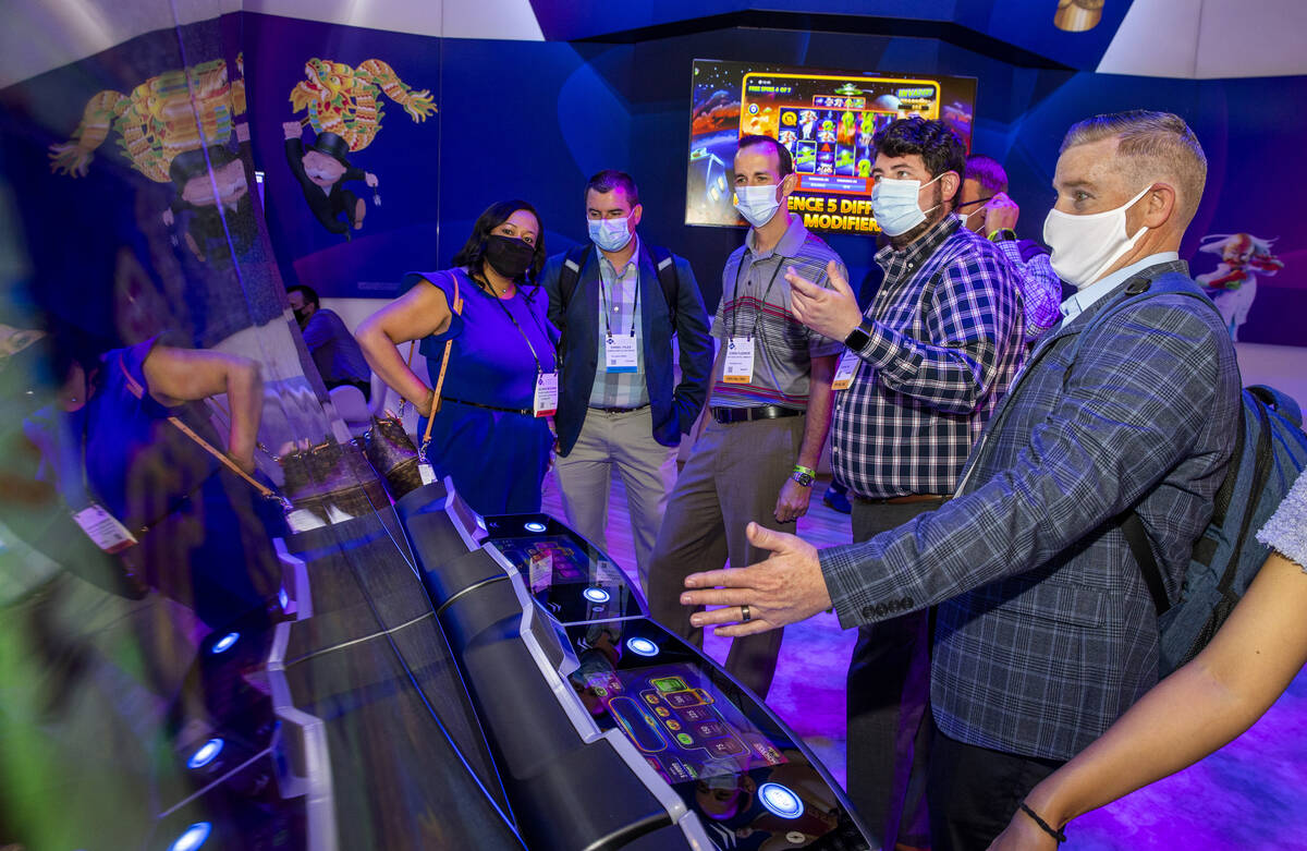 Solbree McGowan, Daniel Files, Chris Fleenor, John OÕBrien and David Elmore play a new gam ...
